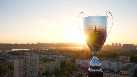 Evening sunset with winner trothy cup Stock Footage 77073901