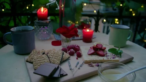 Evening tea with biscuits, chocolate, raspberries and honey Stock Footage 87421036
