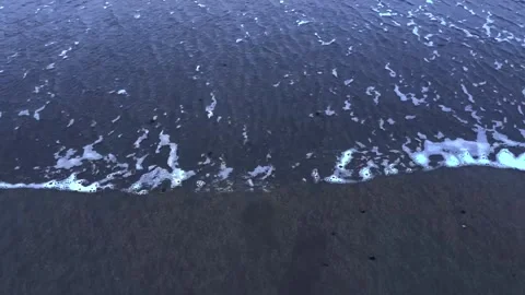Evening tide waves coming into shore Stock Footage 267613201