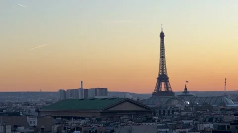 Evening time bathes Paris skyline in alluring golden shadows Stock Footage 337184169