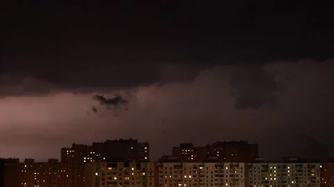 Evening time-lapse of the city with lightning and bad weather. Stock Footage 245484885