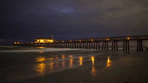 Evening Time Lapse Over Pier and Ocean Tide, Naples, Florida Stock Footage 76721256