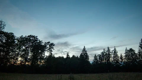 Evening time lapse - sky and rural landscape after sunset. Stock Footage 313454165