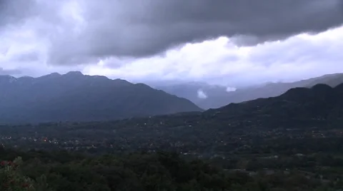 Evening time lapse of a snowstorm blowing over the Ojai Valley, California. Stock Footage 1020093