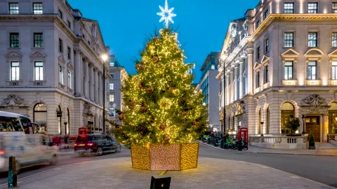 Evening time lapse view of the Christmas Tree at Waterloo Square, London Stock Footage 319026734