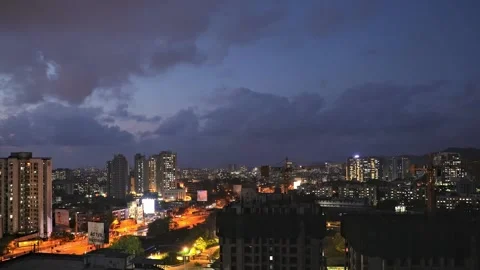 Evening timelapse of Buildings with moving clouds and traffic Stock Footage 157379675