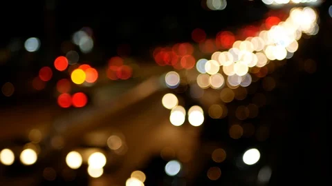 Evening traffic, bokeh effect and motion blur viewed from the road bridge. 動画素材 126310920