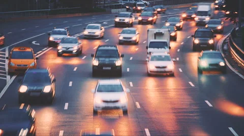 Evening traffic with car lights Stock Footage 67428541