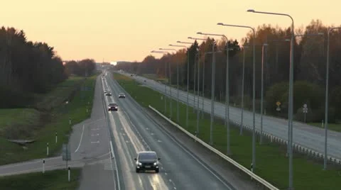 Evening traffic on highway Stock Footage 10572352