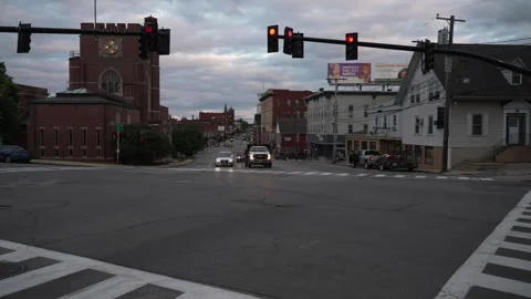 Evening Traffic Timelapse at Town Intersection Video stock 244499680