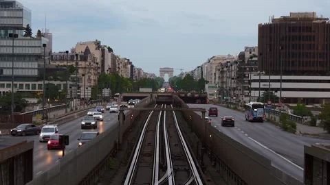 Evening traffic toward Arc de Triomphe in Paris, June 15 2025 Stock Footage 311321804