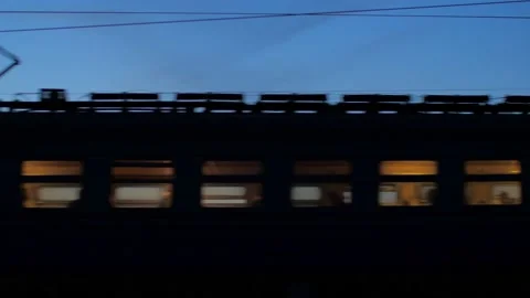 Evening train pass by clode up 動画素材 141249544