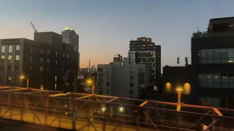 Evening Train Ride Over Williamsburg Bridge With New York City Skyline Views Stock Footage 346198129