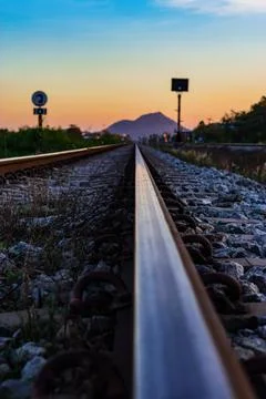 Evening train tracks Stock Photos