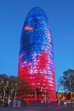 Evening view of Agbar Tower, a modern 34-storey skyscraper on Diagonal Avenue Stock Photos
