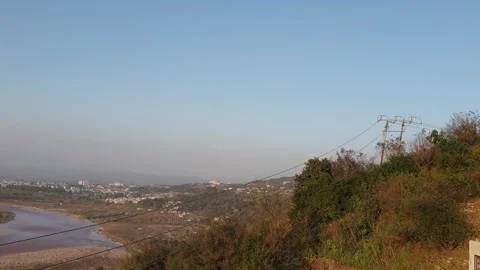 Evening view of bank of river Stock Footage 267675152