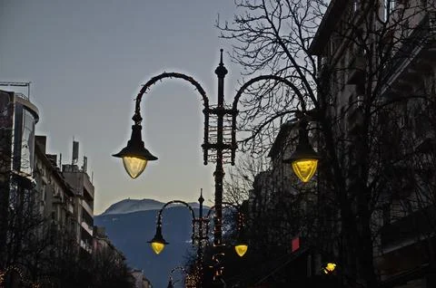 Evening view of a beautiful glowing combination of different light fixtures Stock Photos