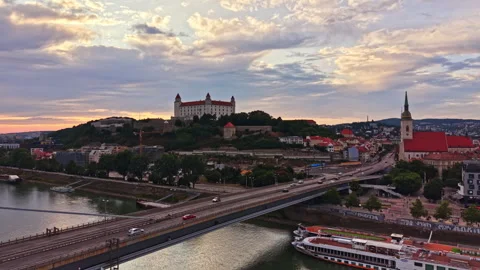 Evening view of Bratislava with castle and river under cloudy sky Stock Footage 340942041