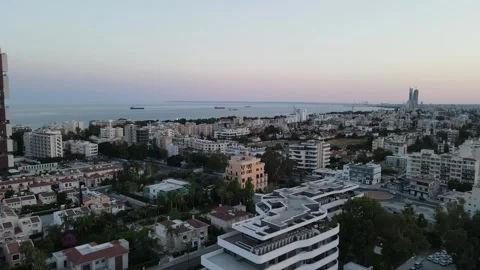 Evening view of the city. Aerial view of the mediterranean sea. Warm sunset. Stock Footage 246917845