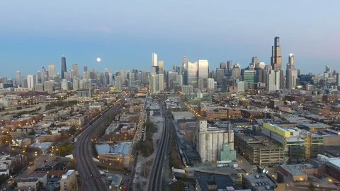 Evening View of City Skyline with moon Flyaway From City Stock Footage 71126895