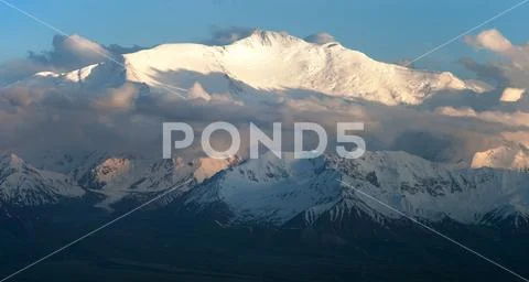 Evening view of Lenin Peak from Alay range - Kyrgyz Pamir Mountains - Kyrgyzs Stock Photos
