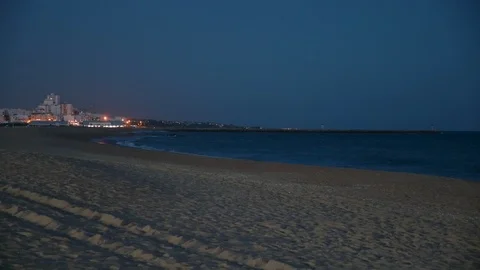 Evening view looking across the sandy beach Stock Footage 106497510