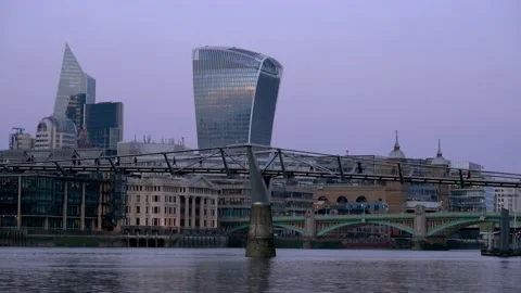 Evening view of Millennium Bridge Stock Footage 153337991