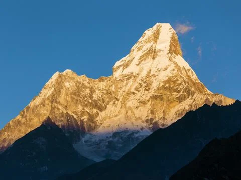 Evening view of mount Ama Dablam peak with blue sky, Khumbu valley, Solukhumb Stock Photos