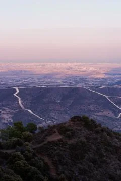 Evening view of the mountain road Stock Photos