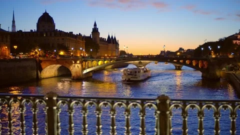 Evening view over the bridges of Paris - CITY OF PARIS, FRANCE - SEPTEMBER 4 Stock Footage 250206428