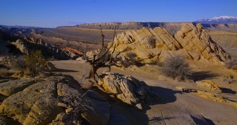 Evening view overlooking the tortured landscape of Strike Valley, Utah Stock Footage 124277865