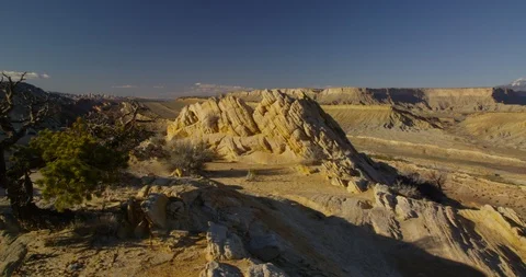 Evening view overlooking the tortured landscape of Strike Valley, Utah Stock Footage 124294711