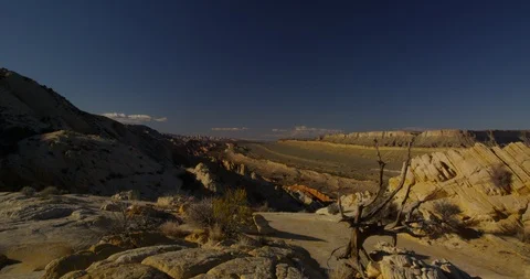 Evening view overlooking the tortured landscape of Strike Valley, Utah Stock Footage 124354498