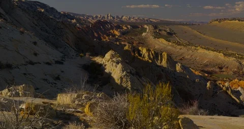 Evening view overlooking the tortured landscape of Strike Valley, Utah Stock Footage 124555726