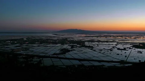Evening view of paddy fields filled with water Stock Footage 144820545