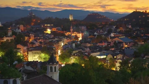 Evening view of Plovdiv old town, Bulgaria. Old illuminated houses and sunset Video stock 141748003