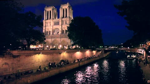 Evening View of the Seine River and Notre-Dame Cathedral Stock Footage 332457333