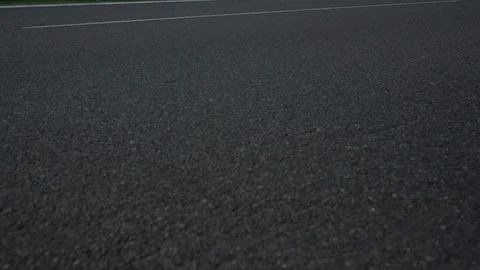 Evening view of the surface of an asphalt road Stock Footage 95196571