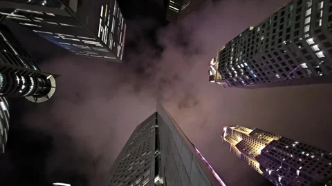 Evening view of towering skyscrapers from below. Singapore 21.01.2025. Editorial Stock Footage 319740197