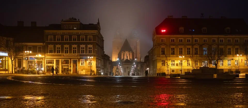 Evening View Of TownS Central Square With Distant Church Stock Photos