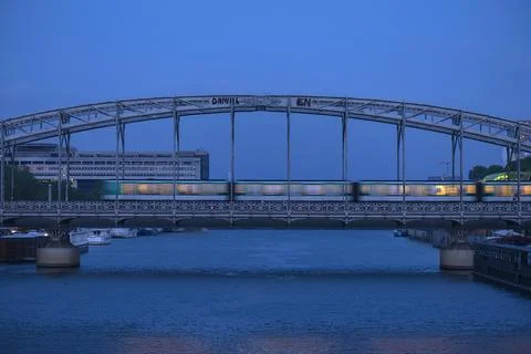 Evening view of the Viaduc dAusterlitz with moving Metro Paris France Europe Stock-Fotos