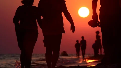 Evening walk along the coast Stock Footage 76026041