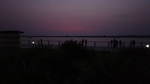 EVENING WALK IN BEACH BANK Video stock 111582669