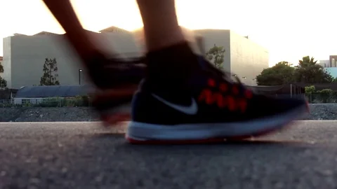 Evening Walkers Interrupt the View Stock Footage 79586595