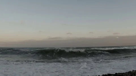 Evening waves arriving on a beach Video stock 72805547