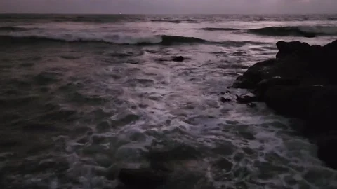 Evening Waves at the Rocky Beach Stock Footage 237074541