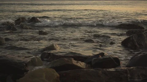 Evening waves on a water surface slow motion Stock Footage