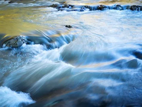 Evening wild river Stock Photos