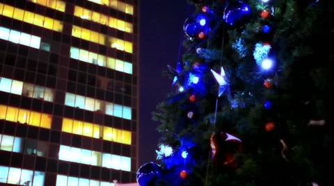 Evening winter christmas tree and business center in the street. Shift motion. Stock-Footage 44984436