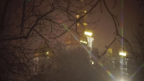 Evening winter park and ancient orthodox church Stock Footage 83687646